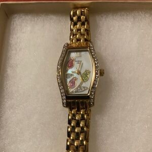 Women Armitron Now Gold plated Crystal Flower Dial Benzel Steel Watch - Preowned